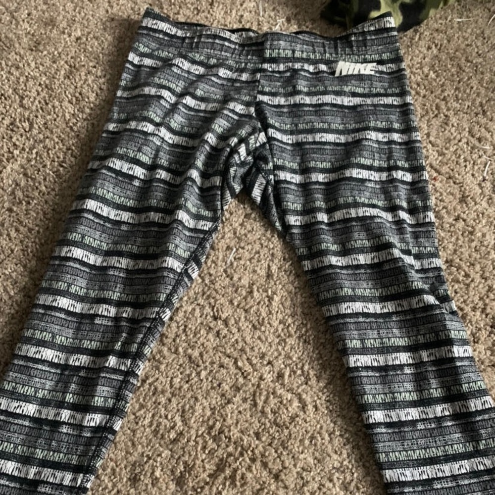 Black white and light green Nike leggings